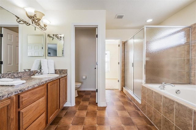 full bathroom with separate shower and tub, toilet, vanity, a notable chandelier, and tile patterned flooring