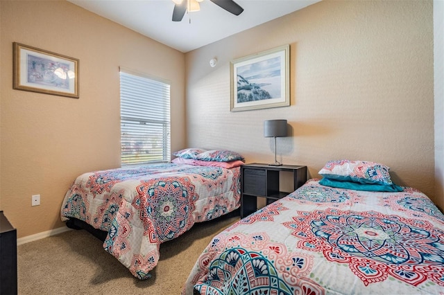 bedroom featuring ceiling fan and carpet floors