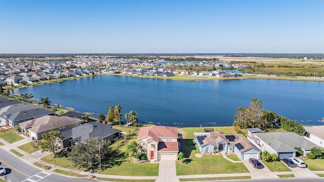 drone / aerial view featuring a water view