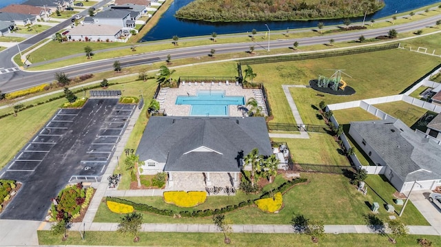 drone / aerial view with a water view