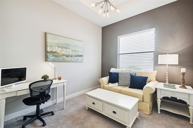 carpeted office space featuring a chandelier