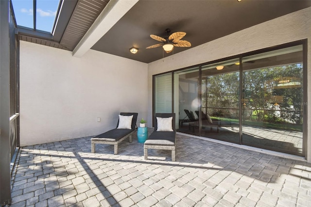 view of patio with ceiling fan