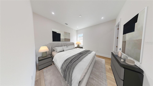 bedroom featuring light hardwood / wood-style flooring