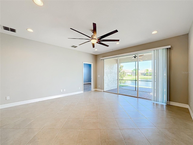 empty room featuring light tile patterned floors