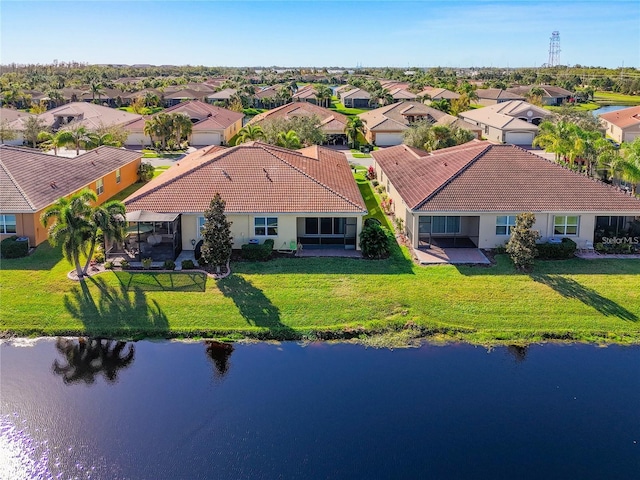 drone / aerial view featuring a water view