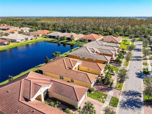 drone / aerial view with a water view