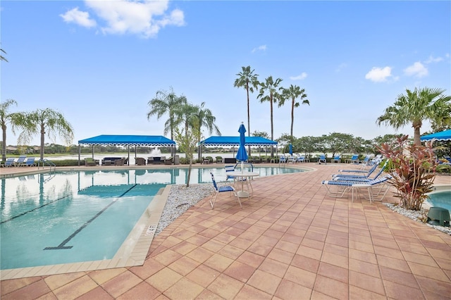 view of swimming pool featuring a patio area