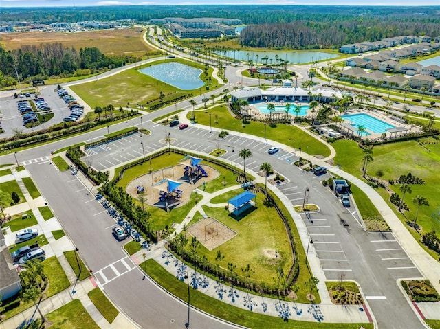 birds eye view of property featuring a water view