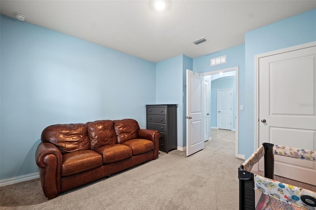 living room featuring light colored carpet