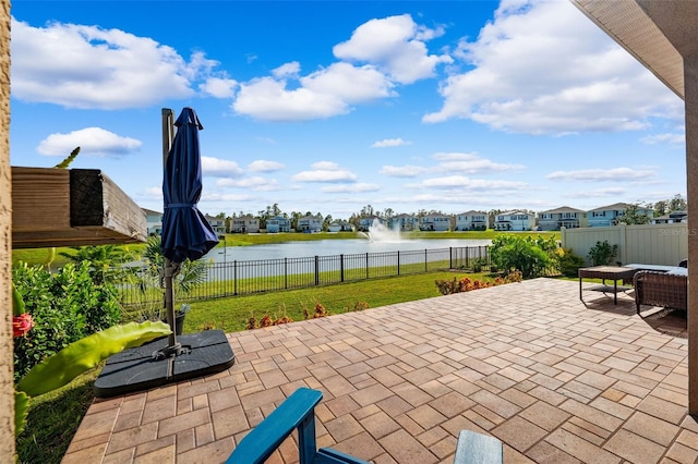 view of patio / terrace featuring a water view