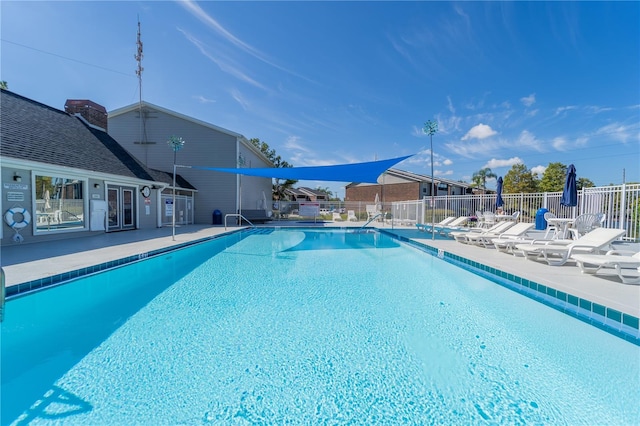 view of swimming pool featuring a patio area