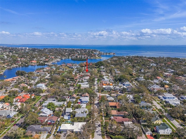 bird's eye view featuring a water view and a residential view