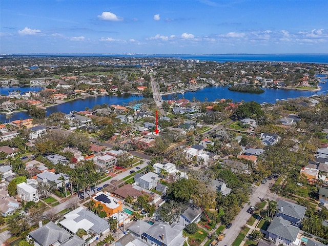 aerial view with a residential view and a water view