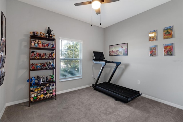 workout area with light colored carpet and ceiling fan