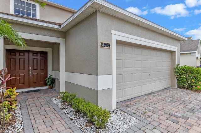 entrance to property with a garage