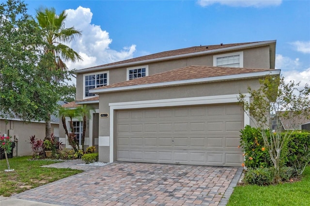 view of front of property featuring a garage