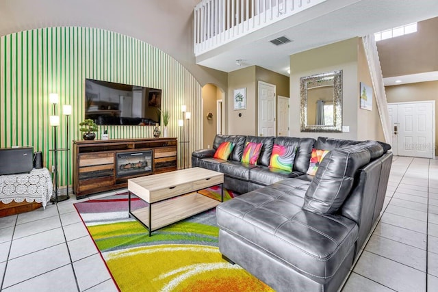 living room with tile patterned floors