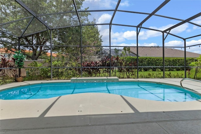 view of pool featuring a patio and a lanai