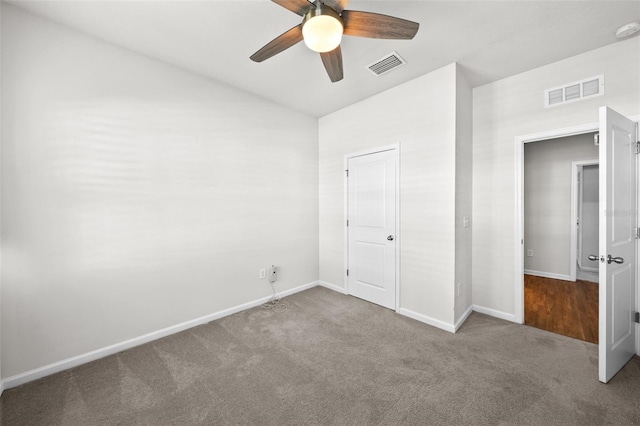 unfurnished bedroom with ceiling fan, a closet, and carpet flooring