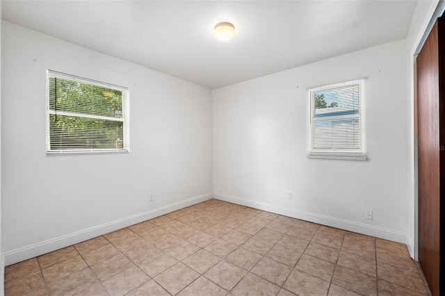 view of tiled spare room