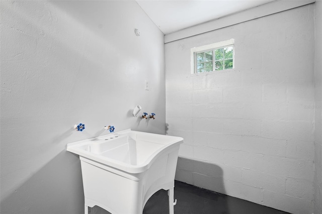 bathroom with concrete floors