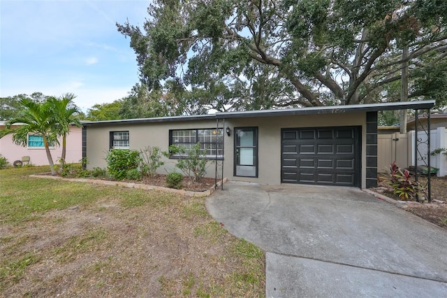 single story home with a garage