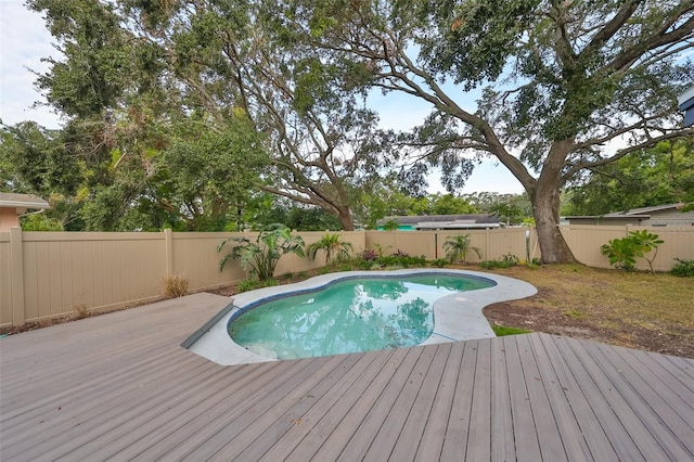 view of pool featuring a wooden deck