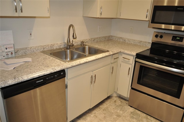 kitchen with appliances with stainless steel finishes and sink