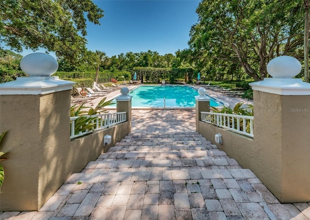 view of pool with a patio area