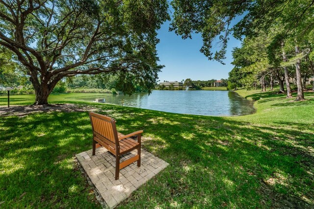 2690 Coral Landings Blvd Unit 722, Palm Harbor, FL 34684 - view of property's community featuring a water view and a yard