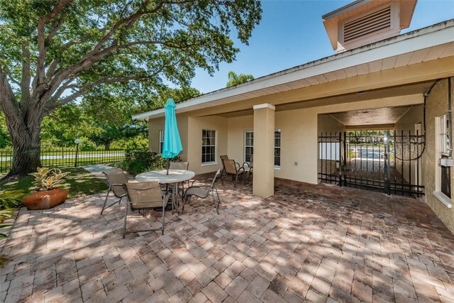2690 Coral Landings Blvd Unit 722, Palm Harbor, FL 34684 - view of patio with outdoor dining space