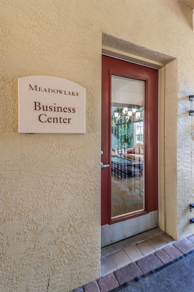2690 Coral Landings Blvd Unit 722, Palm Harbor, FL 34684 - property entrance featuring stucco siding
