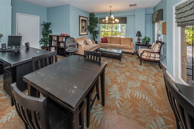 2690 Coral Landings Blvd Unit 722, Palm Harbor, FL 34684 - carpeted dining area featuring a chandelier and healthy amount of natural light