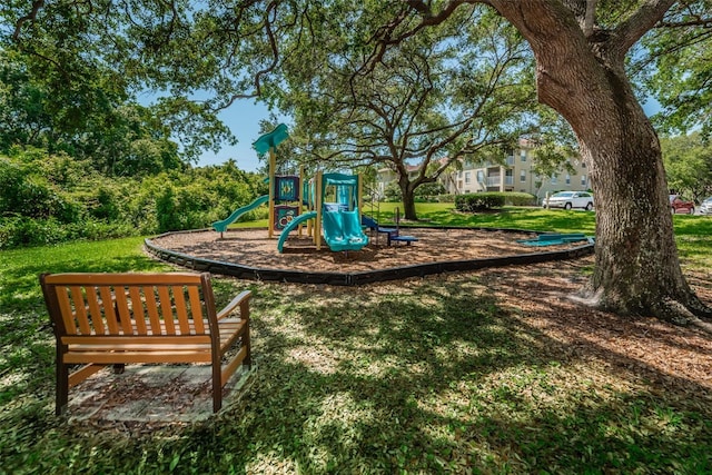 2690 Coral Landings Blvd Unit 722, Palm Harbor, FL 34684 - community jungle gym with a lawn
