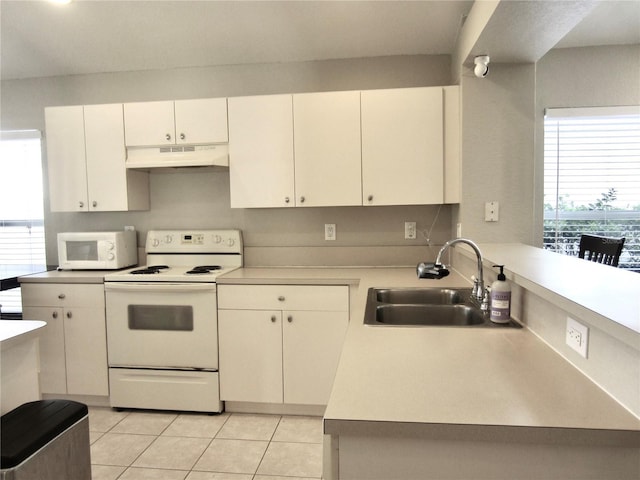 kitchen featuring white cabinets, white appliances, and sink