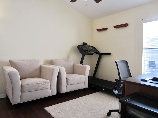 office area featuring dark hardwood / wood-style floors and ceiling fan