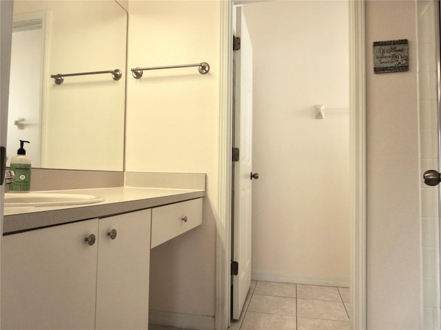 bathroom featuring tile patterned floors and vanity