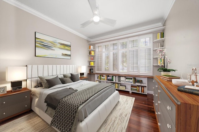 bedroom with ceiling fan, ornamental molding, and dark hardwood / wood-style floors