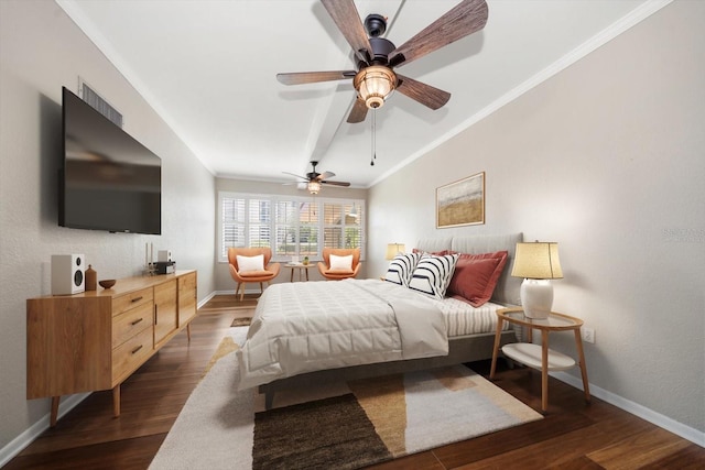 bedroom featuring ceiling fan, ornamental molding, and dark hardwood / wood-style flooring