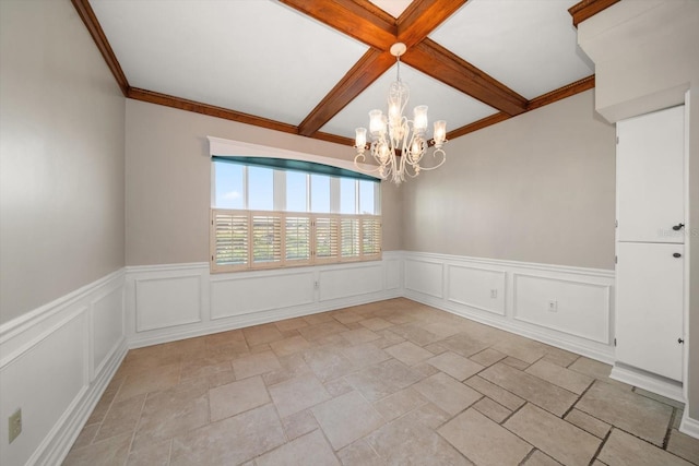 empty room featuring an inviting chandelier, beamed ceiling, and crown molding