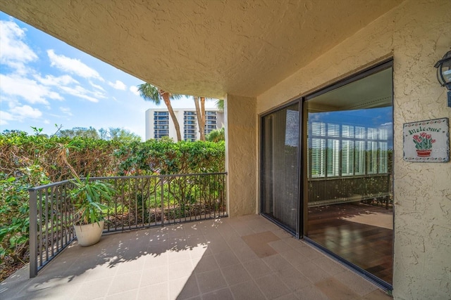 view of patio with a balcony