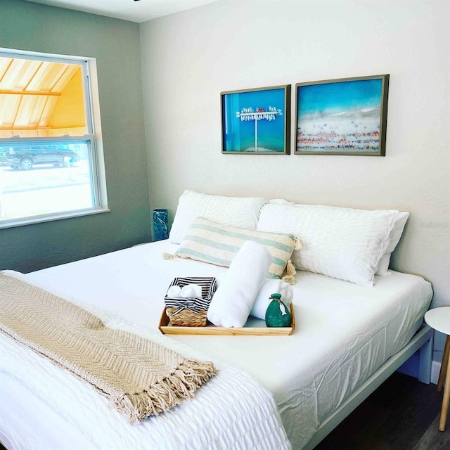 bedroom featuring wood-type flooring