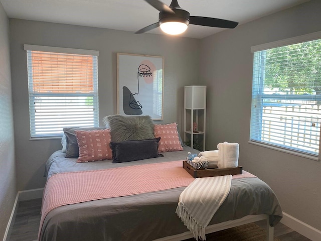 bedroom featuring hardwood / wood-style flooring and ceiling fan