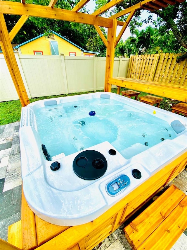 view of patio featuring a hot tub