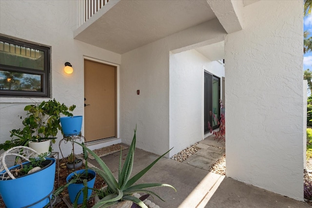 property entrance with a balcony