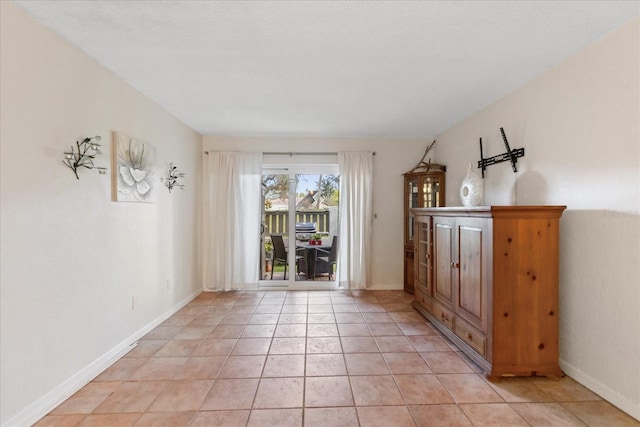 interior space with light tile patterned flooring