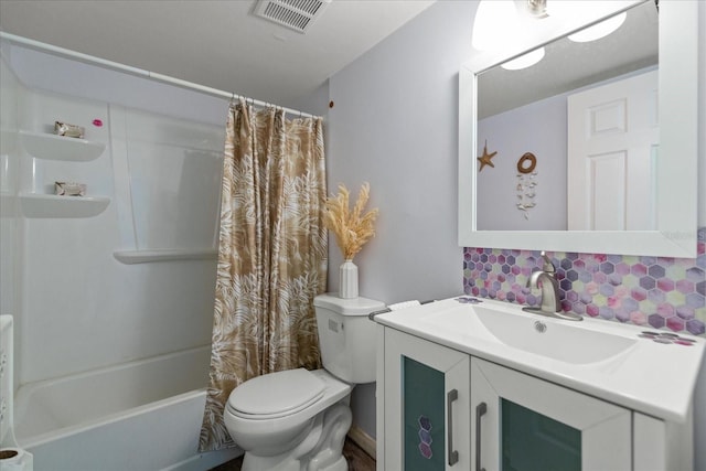 full bathroom featuring backsplash, vanity, shower / tub combo, and toilet