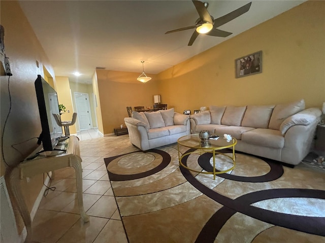 tiled living room featuring ceiling fan