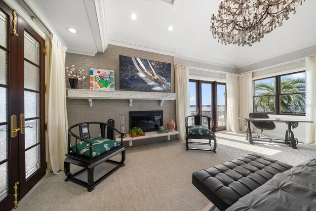 interior space featuring recessed lighting, a fireplace, carpet flooring, and french doors