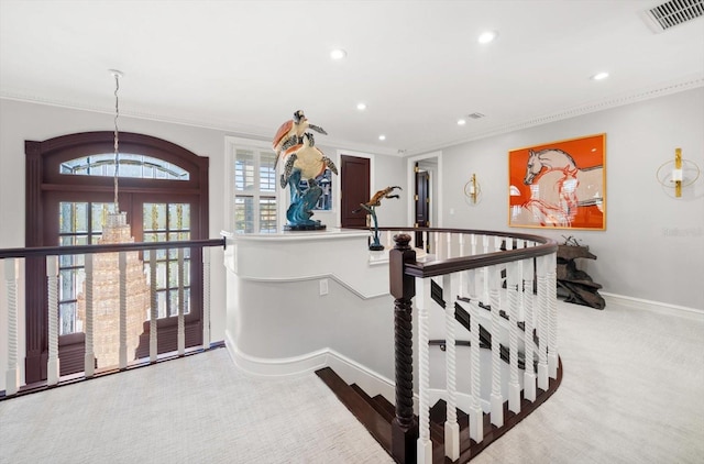 interior space with recessed lighting, visible vents, ornamental molding, light carpet, and baseboards